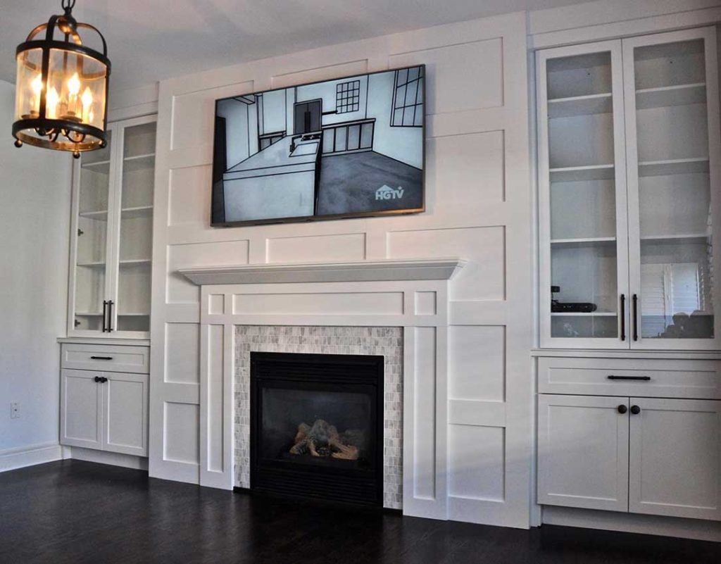 Custom fireplace and feature wall by LIV4 Homes